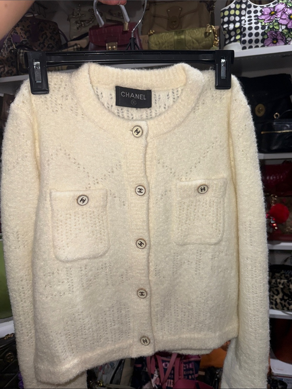 CHANEL Ivory Bouclé Cardigan with Logo Buttons